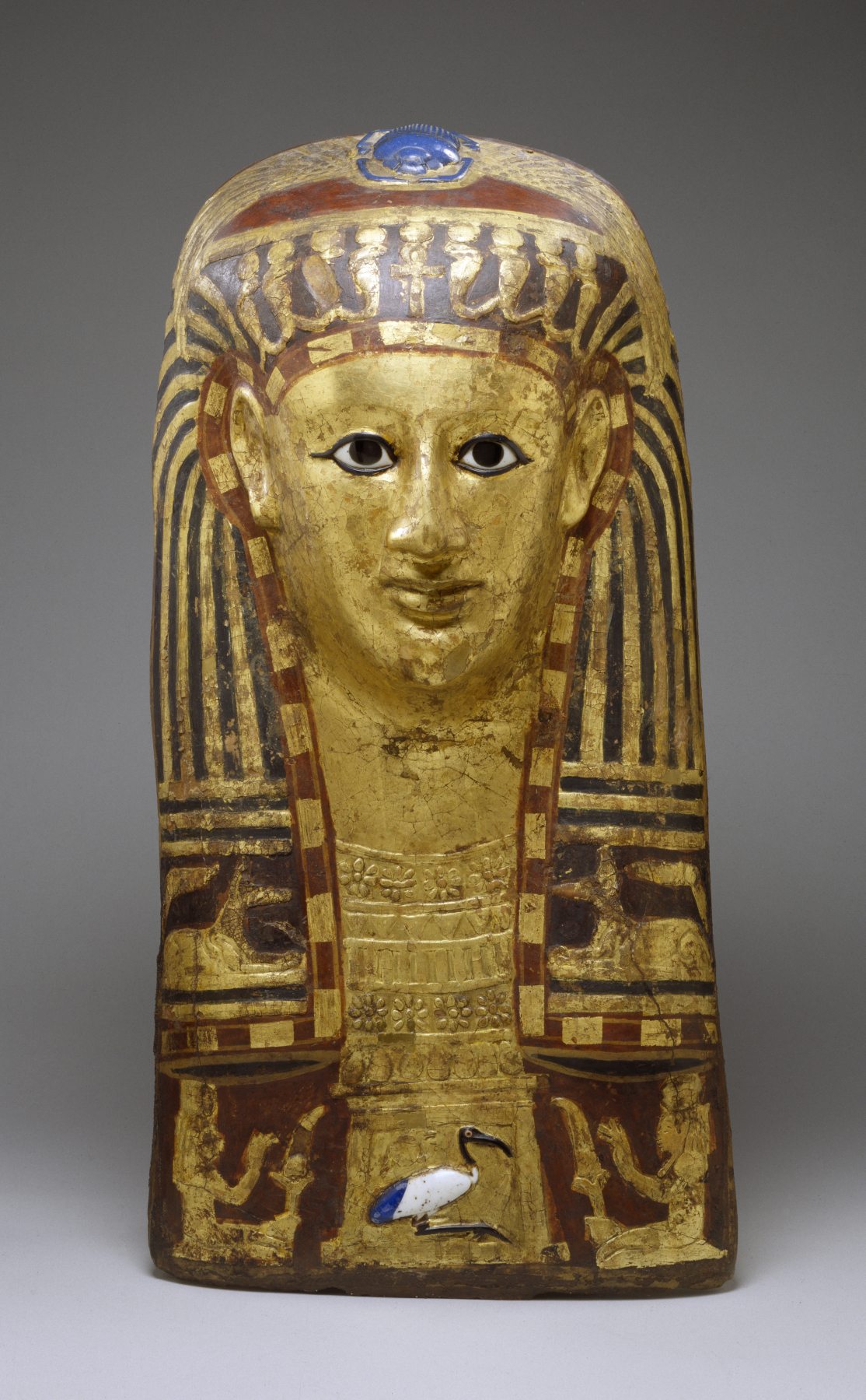 Painted Egyptian mummy mask of a woman